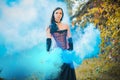 Woman with a colorful smoke bomb, ideas for party Royalty Free Stock Photo