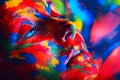 Woman in colourful paint Royalty Free Stock Photo