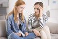 Woman comforting sad depressed sister Royalty Free Stock Photo