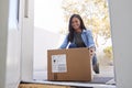 Woman Coming Back To Home Delivery In Cardboard Box Outside Front Door