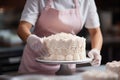 Woman confectioner makes birthday cake in gloves. Professional decorates the cake. Generative AI