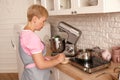 Woman confectioner making sweets in the kitchen