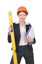 Woman in a construction helmet and a ruler in her hand