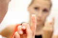 Woman with contact lens on her finger Royalty Free Stock Photo