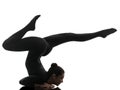 Woman contortionist exercising gymnastic yoga silhouette