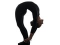 Woman contortionist exercising gymnastic yoga silhouette Royalty Free Stock Photo