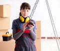 Woman contractor with measuring tape