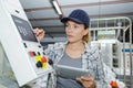 Woman control buttons machine factory operator Royalty Free Stock Photo