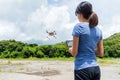 Woman control with drone