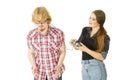 Woman controling man using gaming pad Royalty Free Stock Photo