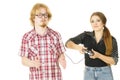 Woman controling man using gaming pad Royalty Free Stock Photo