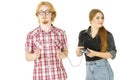 Woman controling man using gaming pad Royalty Free Stock Photo