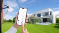 Woman controls temperature and home devices with a smart home app