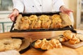 Woman cook with baked goods