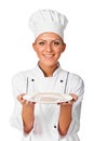 Woman cook or chef serving empty plate and smiling happy