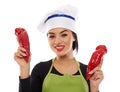 Woman cook with red peppers Royalty Free Stock Photo