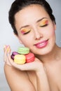 Woman with cookies makarons Royalty Free Stock Photo