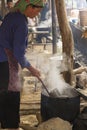 A woman is cooking boiled meat at Bac Ha Royalty Free Stock Photo