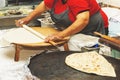 Woman cooking cakes gozleme.