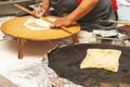 Woman cooking cakes gozleme.