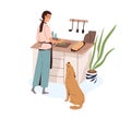 Woman cooking food for home dinner at kitchen. Happy person preparing meat dish. Female cook meal, dog looking and