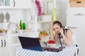 Woman cooking food in the kitchen. Royalty Free Stock Photo