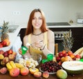 Woman cooking fruit salad with yoghurt