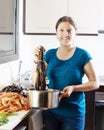 Woman cooking with lobster in home Royalty Free Stock Photo