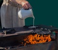 Woman cooking pancake