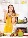 Woman cooking pizza. Royalty Free Stock Photo