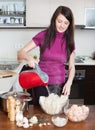 Woman cooking rice noodles with seafoods Royalty Free Stock Photo