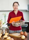 Woman cooking soup with mushrooms Royalty Free Stock Photo