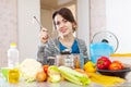 Woman cooking soup