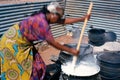 A woman cooking in South Africa