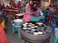 Woman cooking tortillas