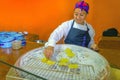 Woman Cooking Tortillas in Oaxaca