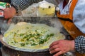 woman cooking traditional chinese street food cuisine in shanghai china