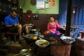 Woman cooking in traditional restaurant Nepal