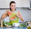 Woman cooking trout in steamer Royalty Free Stock Photo