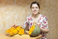 Woman cooks pumpkin