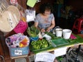 A woman cooks a Thai dessert at Amphawa Floating Market Royalty Free Stock Photo