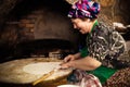 Woman cooks a traditional Turkish pancake