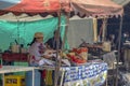 A woman cooks typical food