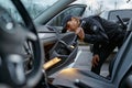 Woman cop using flashlight for car examining Royalty Free Stock Photo