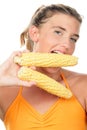 Woman with corn cobs