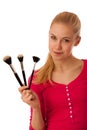 Woman with cosmetics brushes for makeup isolated.