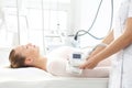 Endermology, vacuum massage using the head. Slimming treatment for thighs Royalty Free Stock Photo