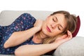 Woman on the couch having a headache Royalty Free Stock Photo