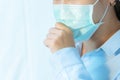 Woman cough with face mask protection, Coronavirus, air pollution, allergic sick woman with medical mask