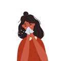 Woman coughing into tissue